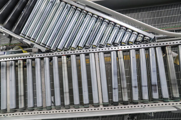 istock conveyor belt in a modern logistic warehouse 2157696819