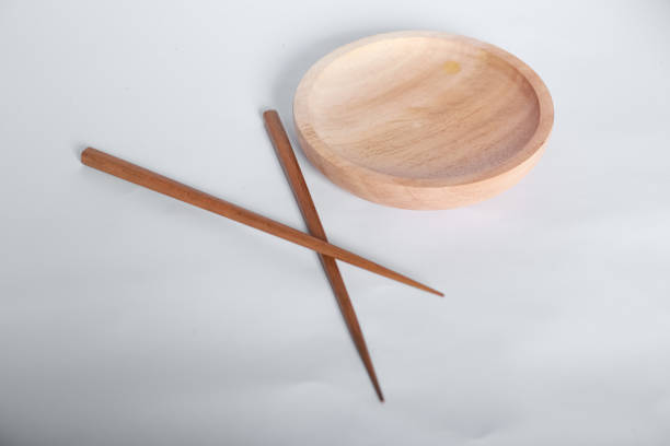 istock Wooden chopsticks and plates. Suitable for food menus, articles and banners 2157698368