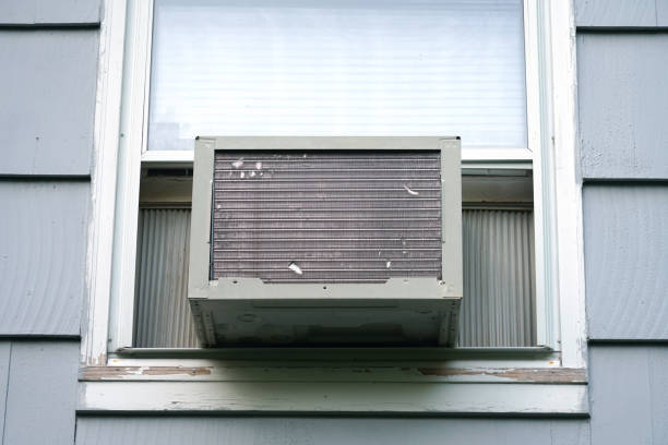 istock old air conditioner installed on house window 2157701750