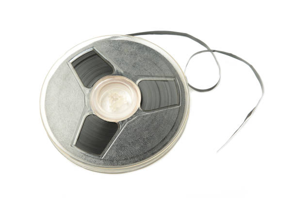 Vintage Film Reel on Blue Background: Nostalgic Cinematic Symbol