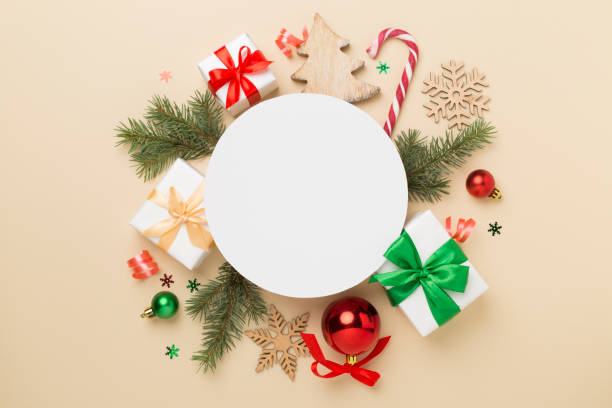 istock Greeting card mockup with christmas decor on color background, top view 2157705357