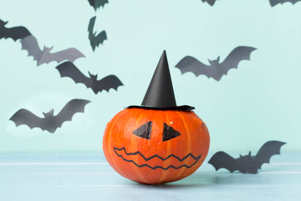 istock Halloween composition with jack o lanter decor on wooden table 2157705370