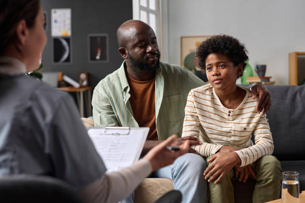 istock Boy Listening to Psychologist During Family Therapy 2157706830