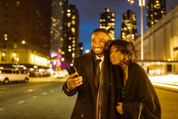 istock Elegant Couple at Times Square Theatre Night 2157707953