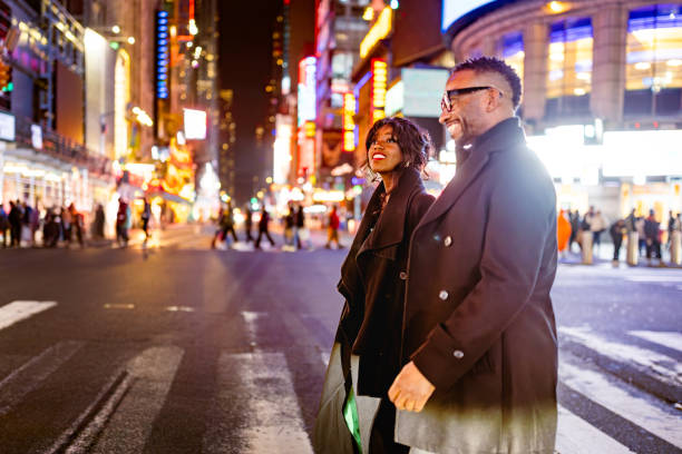 Elegantly Dressed Couple at Times Square Evening