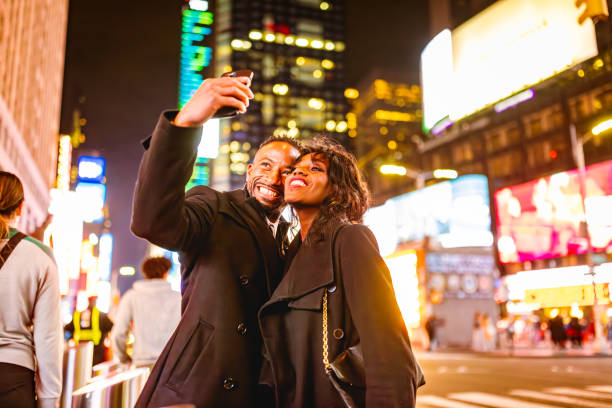 istock Elegant Couple at Times Square Theatre Night 2157708031