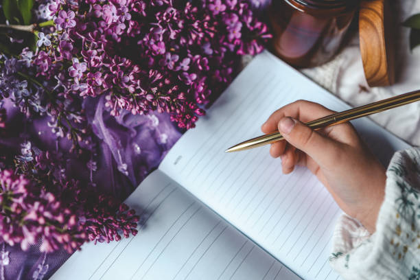 istock Girl writes in a notebook, aesthetics 2157709669
