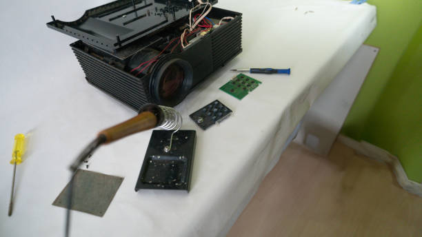 istock Video and multimedia projector open for maintenance with led lamp 2157710662