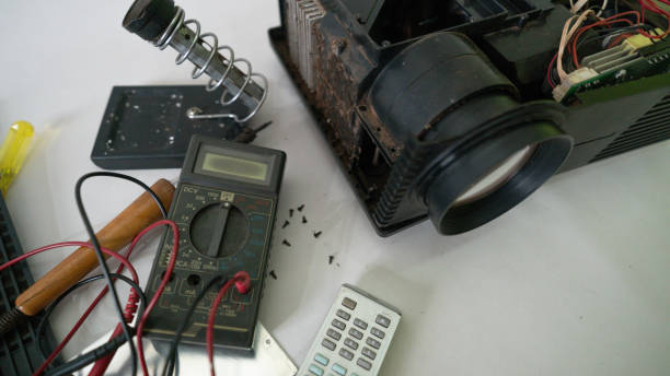 istock Video and multimedia projector open for maintenance with led lamp 2157710714