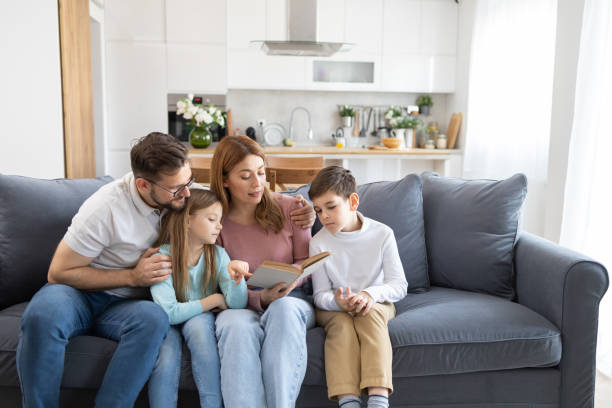istock Family sitting together and engaging in reading 2157710984