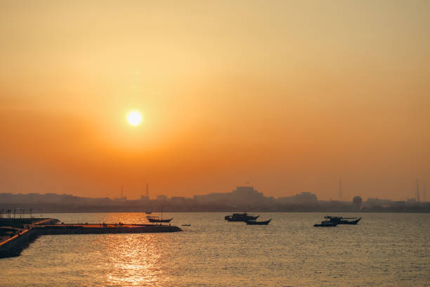 istock Waterfront in Doha during a colorful sunset 2157711304