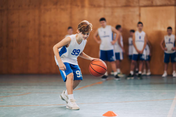 istock Youth basketball practice session 2157711314