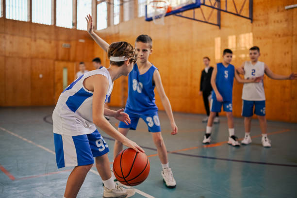 istock Intense one-on-one basketball drill with kids 2157711336