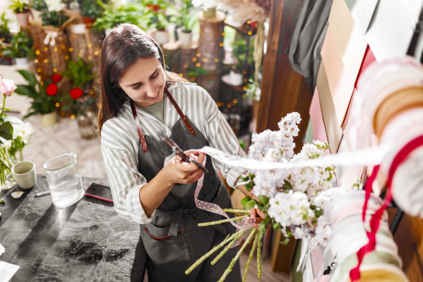 istock Cheerful Florist Creating Bouquet 2157713043