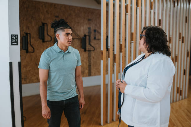 istock Peruvian young man speaking with his doctor 2157713468