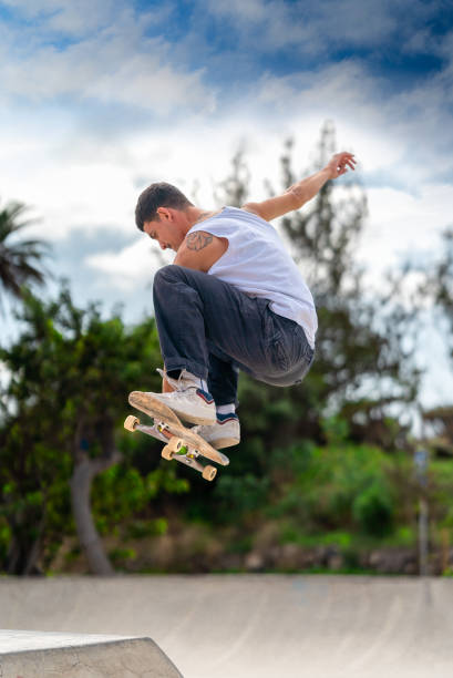 istock young man skates in a skate park in a cloudy day 2157714261