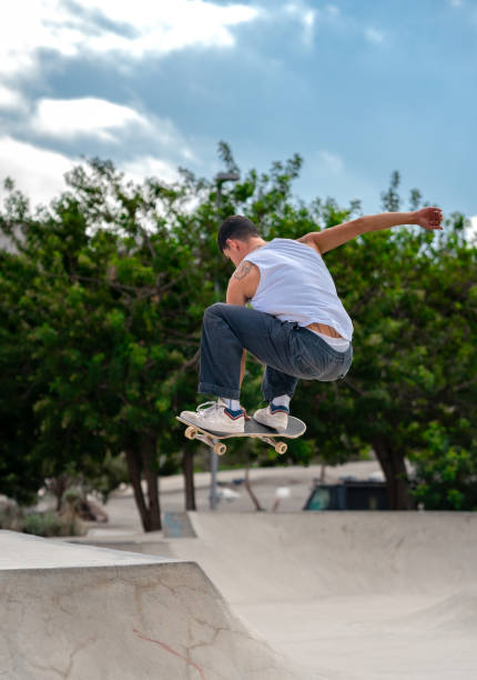 istock young man skates in a skate park in a cloudy day 2157714279