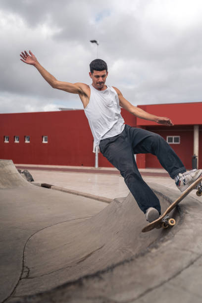 istock young man skates in a skate park in a cloudy day 2157714344