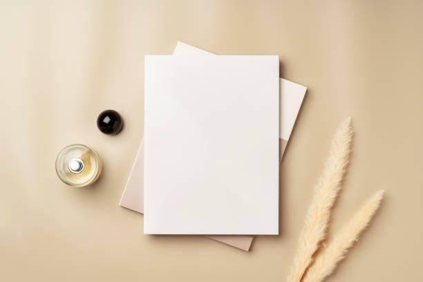 istock Blank stack of paper on beige background top view 2157717355