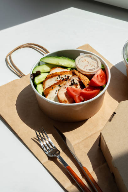 istock Take out poke bowl with craft bag on white background 2157717445