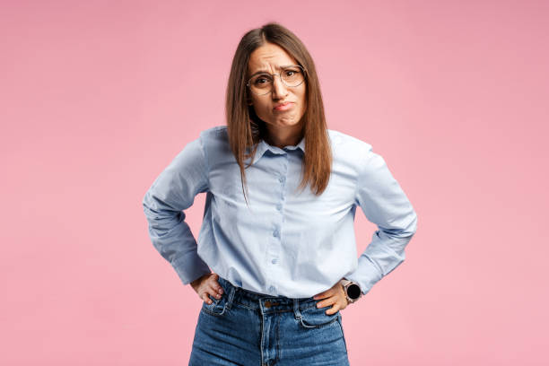 istock Young brunette woman wearing glasses disapproving expression on face posing in studio 2157718631