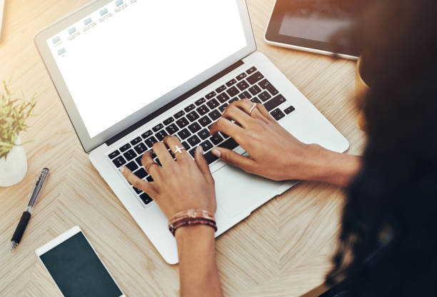 istock Screen, hands and laptop at desk with journalist working from home with typing on keyboard. Education, student and journalism study with technology in house for online communication on internet. 2157718940