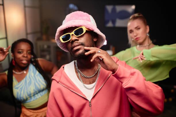 istock Dance Crew with Black Man Wearing Pink Outfit 2157721976