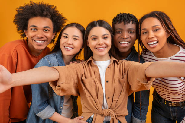 istock Group of friends posing for a camera 2157722394