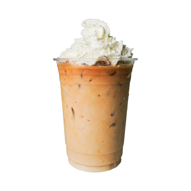 istock Iced coffee on plastic glass with whipped cream on top isolated white background, summer drink concept 2157728105