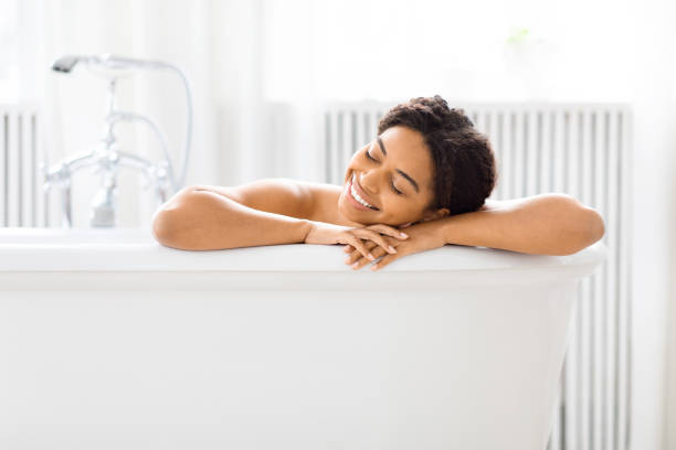 istock Woman resting her head on bath edge 2157729759