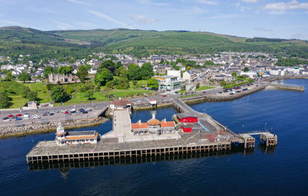 istock Dunoon victorian pier, derelict wooden structure and buildings 2157730220
