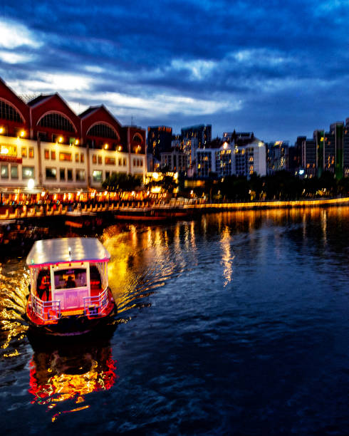 istock River cruise at night on Singapore Clarke Quay 2157731885