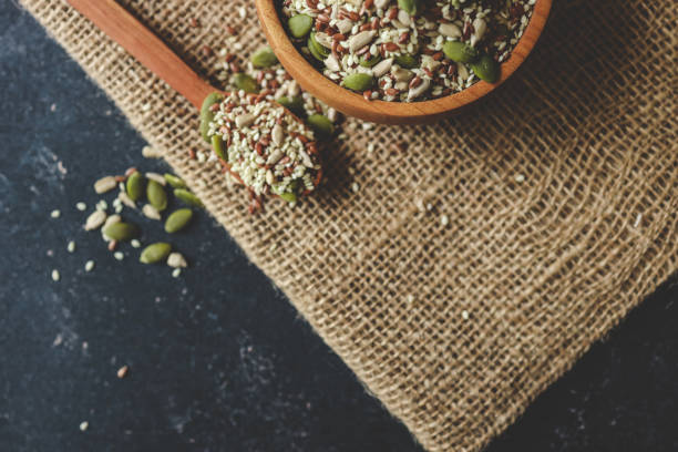 Mixed dry organic cereal and grain seed pile on white background. For healthy food ingredient or carbohydrate food type and agricultural product concept