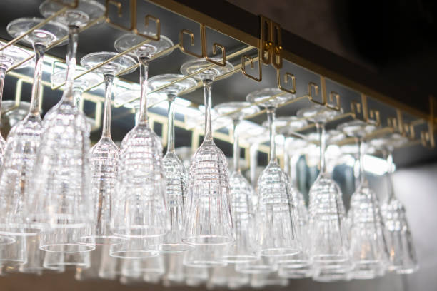 istock Array of Sparkling Bar Glasses Neatly Arranged on a Hanging Glass Rack 2157739993