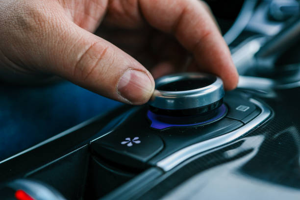 istock Car multimedia system control joystick. Radio, multimedia, and navigation adjustment buttons 2157741446
