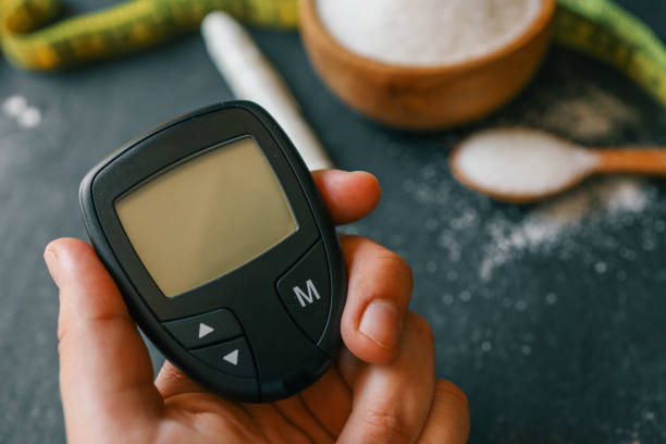istock Instruments for measuring blood sugar top view on black background 2157741698