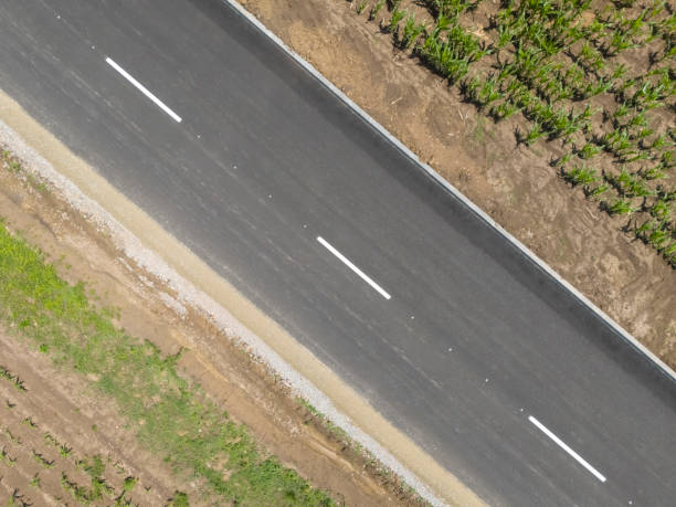 istock New built asphalt road in countryside 2157741804