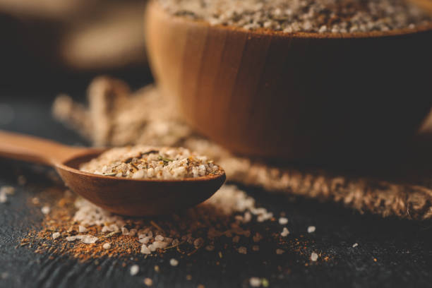 istock Wooden plate with sea salt and spices 2157745470