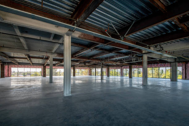 istock Unfinished office space with concrete floor. 2157747928