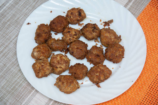 meatballs,chiftele, on a  white plate from Romania, Bistrita