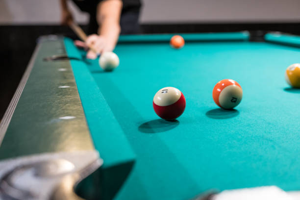 istock Person Playing Billiard Game Holding a Pool Cue 2157750800