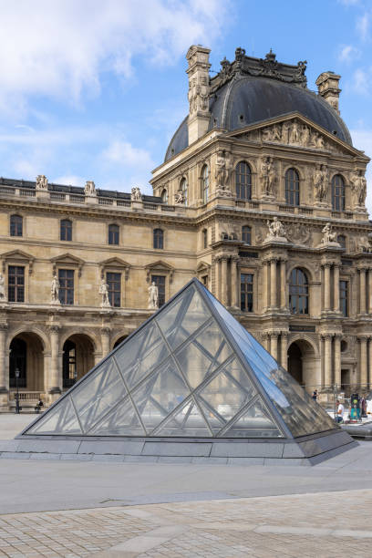 Paris, France - June 05 2024: The pyramid at the Louvre Museum
