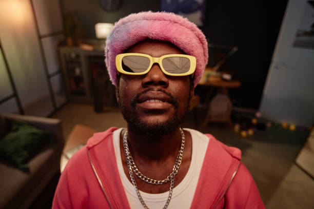istock Black Man Wearing Pink Outfit with Sunglasses 2157752095