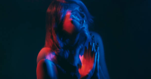 istock Split mind blur woman stress pleading silhouette 2157757452