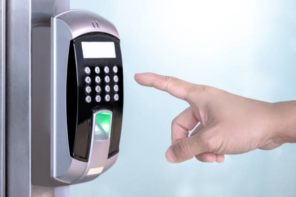istock Smart electronic security fingerprint door lock system for access protection of private room in office, hotel, apartment. Male hand entering password by keypad number scan device machine. 2157762293
