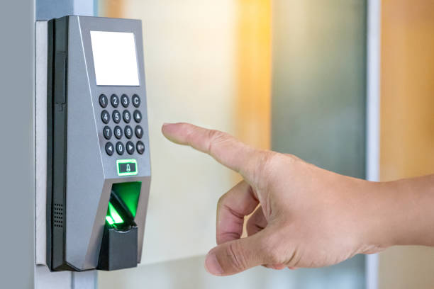 istock Smart electronic security fingerprint door lock system for access protection of private room in office, hotel, apartment. Male hand entering password by keypad number scan device machine. 2157762316