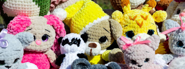 istock Panorama of soft bright toys as a background 2157764605
