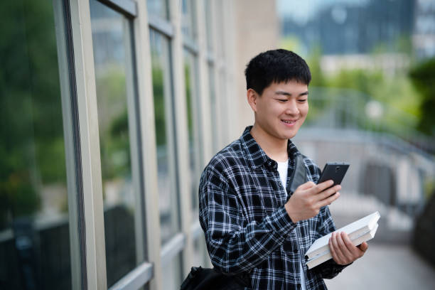 istock Adult male student on university campus 2157766456