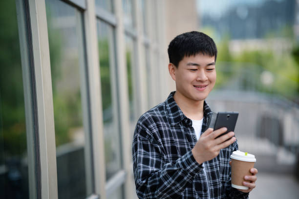 istock Adult male student on university campus 2157766469