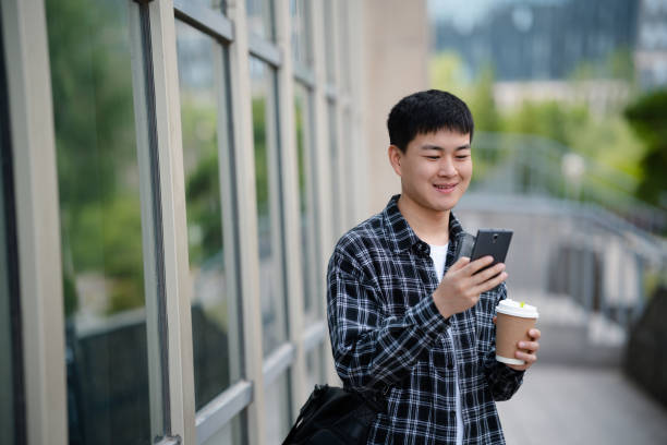istock Adult male student on university campus 2157766470